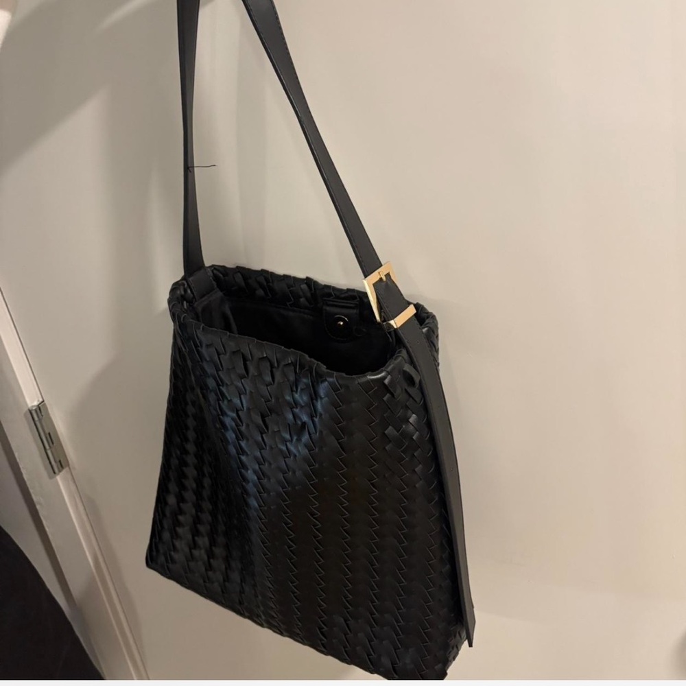 Black woven tote bag